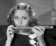 Connee Boswell Playing Flute